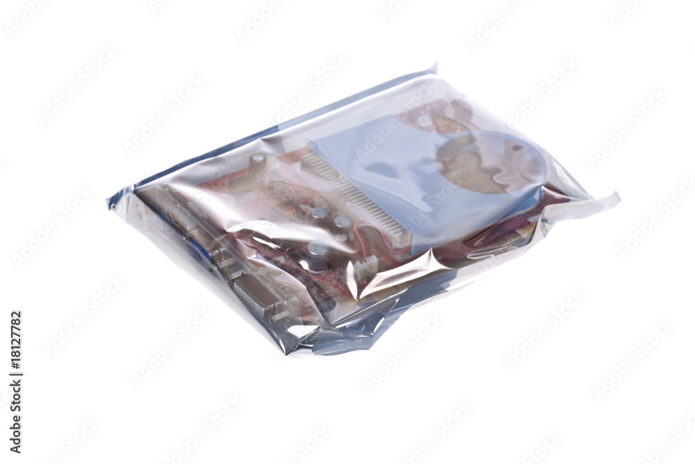 a plastic bag with a computer component inside