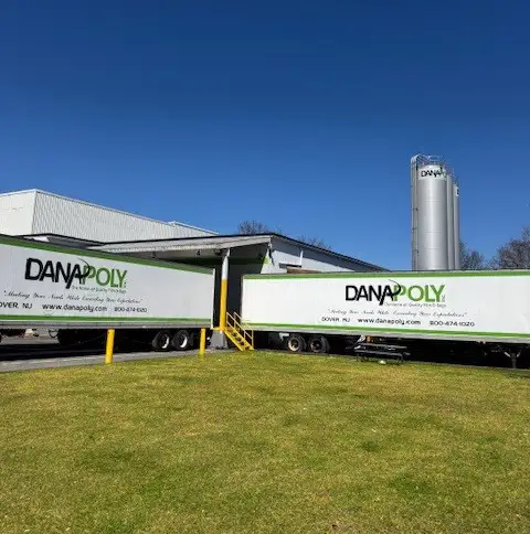 a truck parked in front of a building
