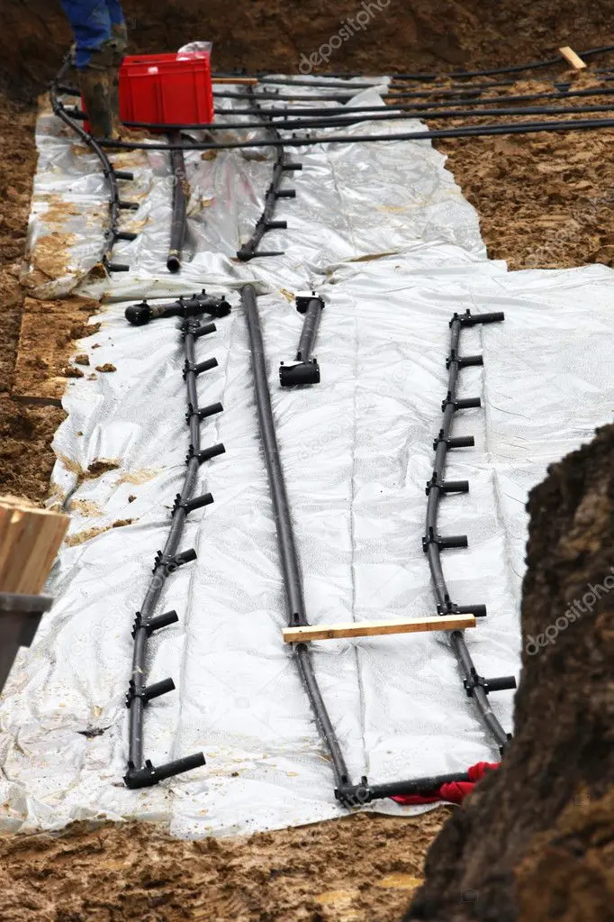 a plastic sheet with pipes on it