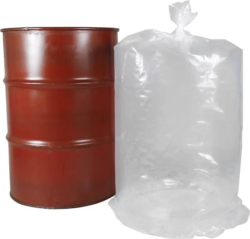 a plastic bag next to a barrel