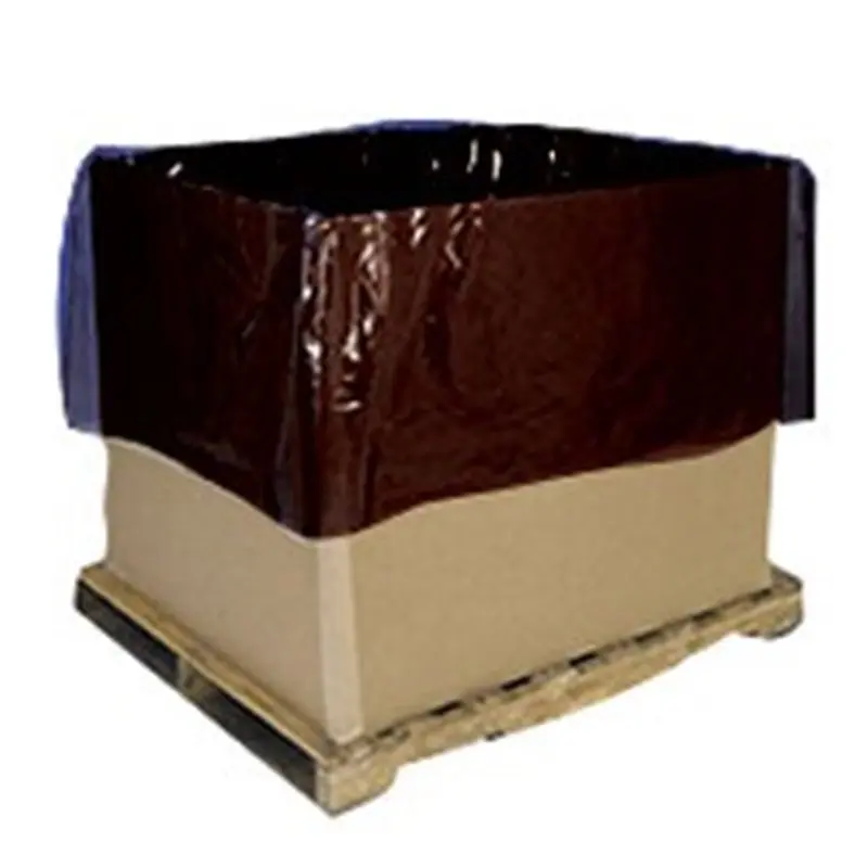 a brown and black plastic bag over a brown box