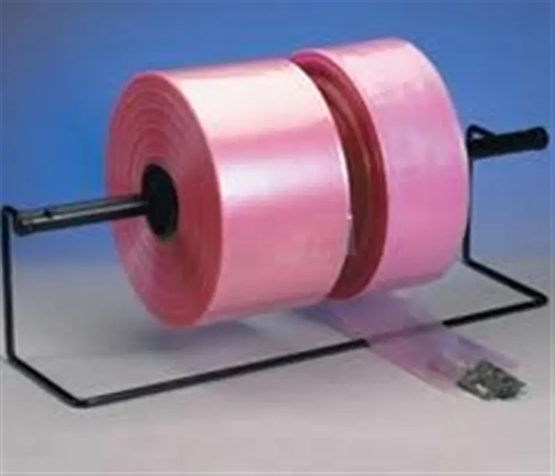 a roll of pink tape on a black stand