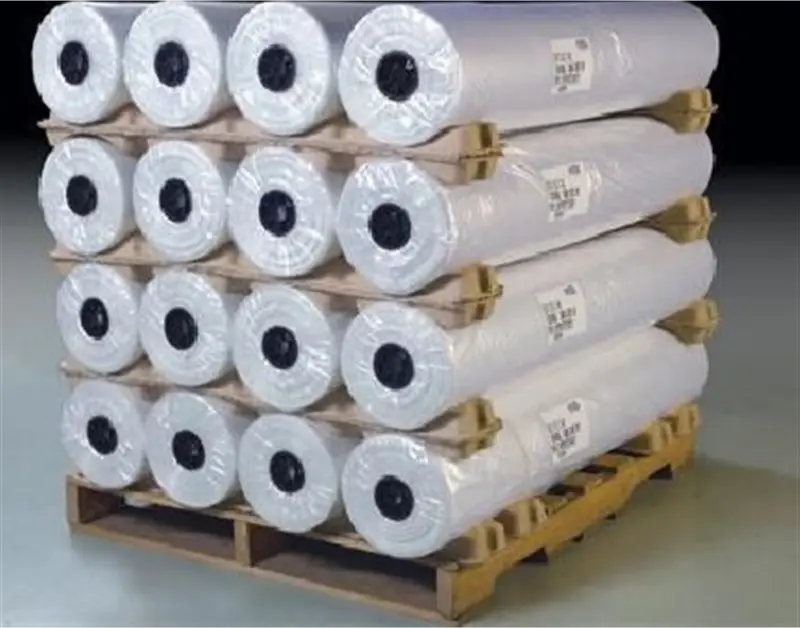 a pallet of rolls of plastic